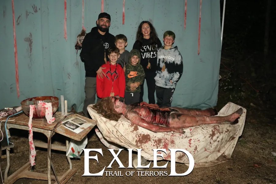 A group of guests at an Exiled haunted set